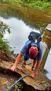 climbing down to cross the river
